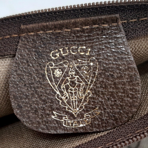 739 - A Gucci Monogram Canvas Pochette. 31cm x 24cm. Ref: 13022.