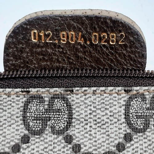 739 - A Gucci Monogram Canvas Pochette. 31cm x 24cm. Ref: 13022.