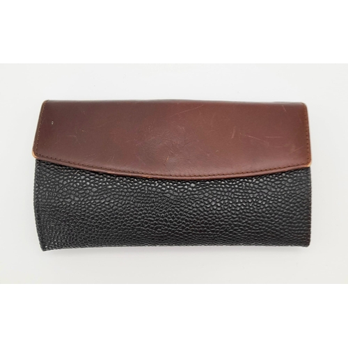 939 - A Mulberry Blue and Brown Leather Purse/Wallet. 17cm x 9cm. Ref: 13005