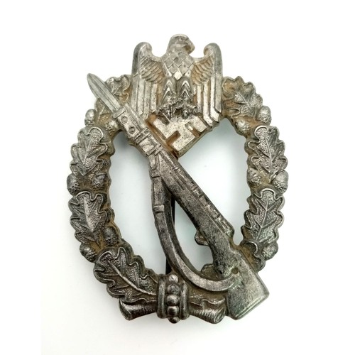 621 - 3rd Reich Mid War Solid Back Infantry Assault Badge.
