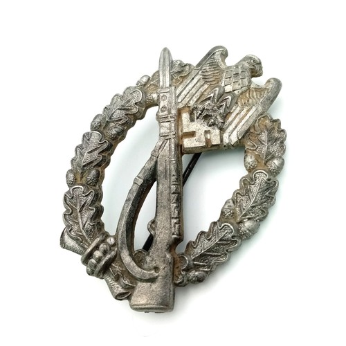 621 - 3rd Reich Mid War Solid Back Infantry Assault Badge.