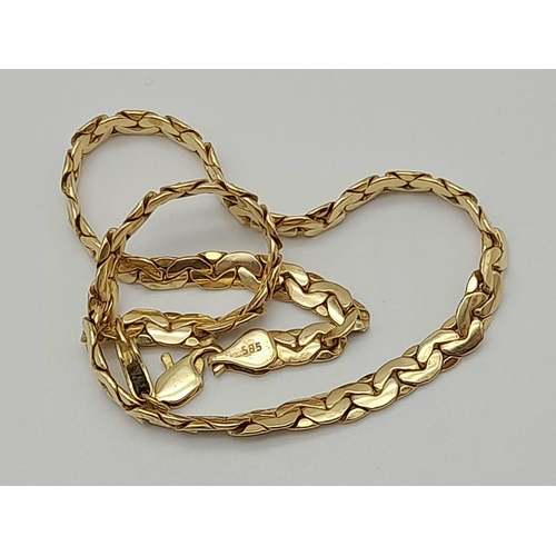 52 - A 14K Yellow Gold Flat Tight-Curb-Link Long Bracelet. 27cm.
5.93g