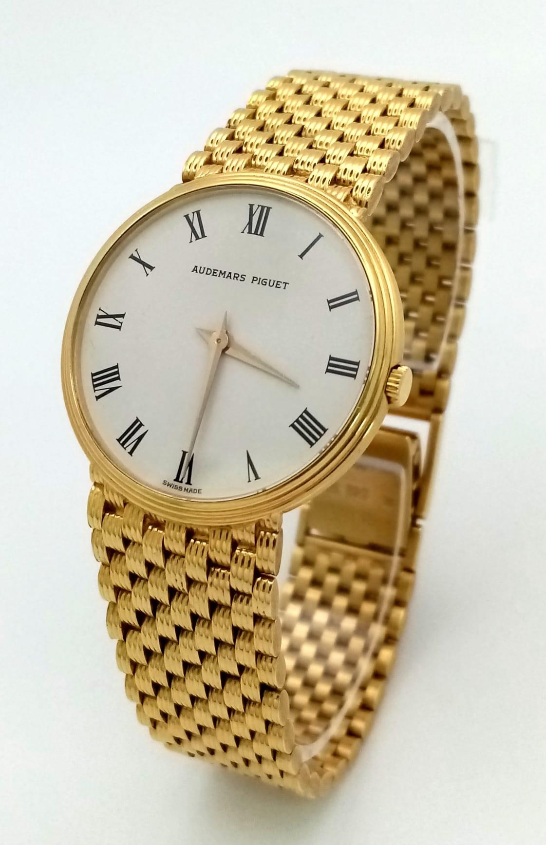 A SOLID 18K GOLD AUDEMARS PIGUET GENTS DRESS WATCH WITH WHITE DIAL