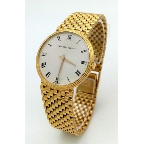 A SOLID 18K GOLD AUDEMARS PIGUET GENTS DRESS WATCH WITH WHITE DIAL