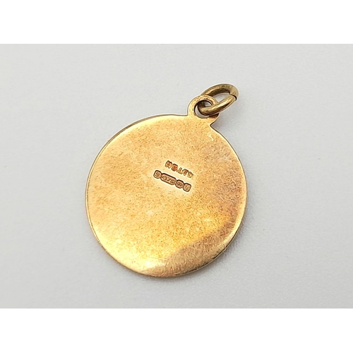 1228 - A Vintage 9K Yellow Gold St. Christopher Pendant. 14mm diameter. 1.77g