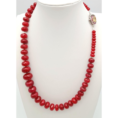 87 - A 480ct Ruby Gemstone Necklace with a Citrine and Ruby Surround 925 Silver Clasp. Graduated ruby ron... 