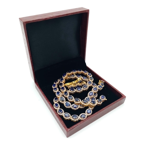 122 - A Captivating Blue Sapphire and Diamond Necklace with Matching Earrings - set in Gold Plated 925 Sil... 