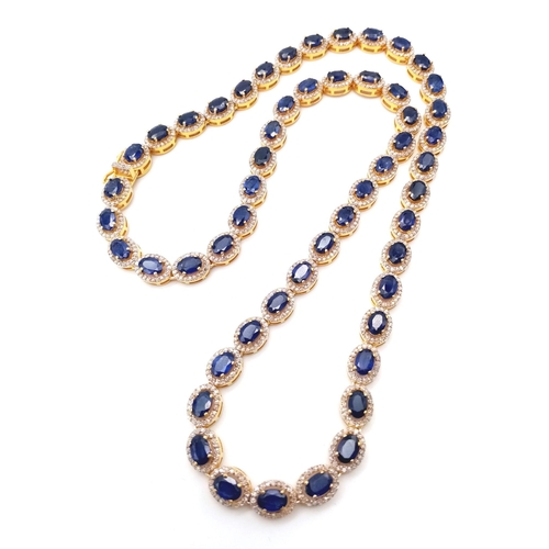 122 - A Captivating Blue Sapphire and Diamond Necklace with Matching Earrings - set in Gold Plated 925 Sil... 