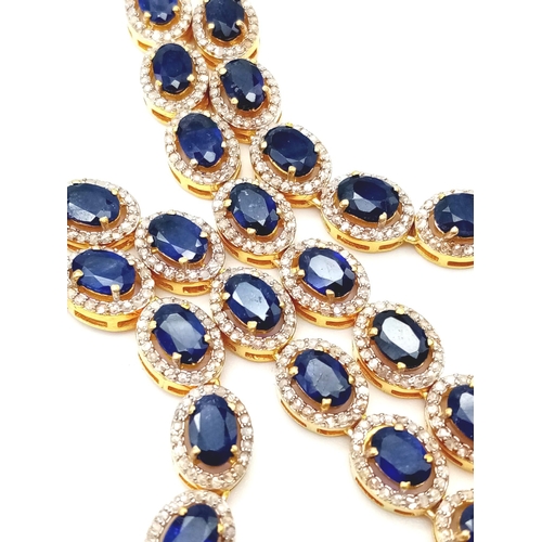 122 - A Captivating Blue Sapphire and Diamond Necklace with Matching Earrings - set in Gold Plated 925 Sil... 