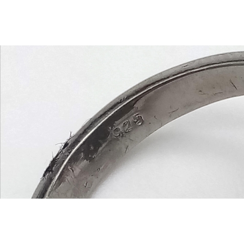 222 - A 10.75ct Blue Sapphire Gemstone Ring with 1.65ct Diamond Accents. Set in 925 Silver. Size N. 10.78g... 