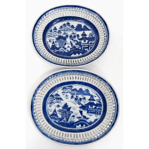 106 - An Early 19th Century Chinese Graduated Set of Two Pierced Blue and White Dishes. 22cm and 25cm.