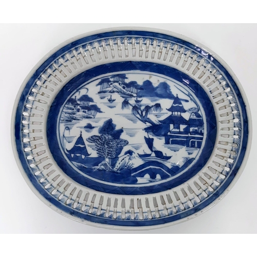 106 - An Early 19th Century Chinese Graduated Set of Two Pierced Blue and White Dishes. 22cm and 25cm.