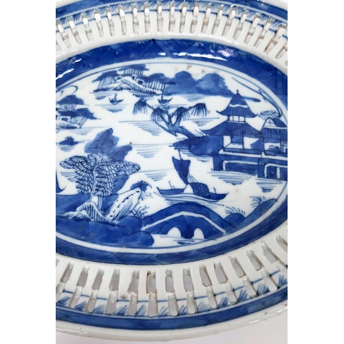 106 - An Early 19th Century Chinese Graduated Set of Two Pierced Blue and White Dishes. 22cm and 25cm.