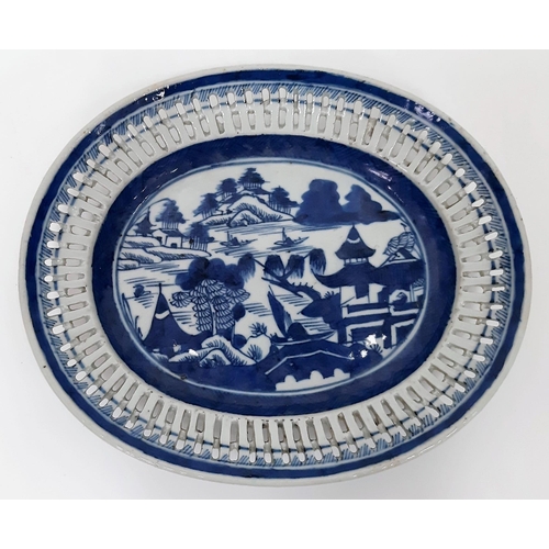 106 - An Early 19th Century Chinese Graduated Set of Two Pierced Blue and White Dishes. 22cm and 25cm.