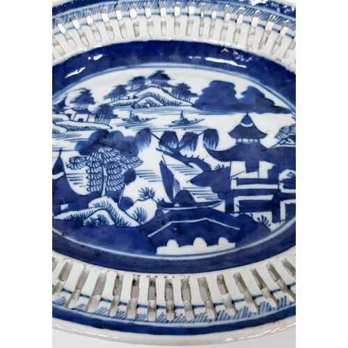 106 - An Early 19th Century Chinese Graduated Set of Two Pierced Blue and White Dishes. 22cm and 25cm.