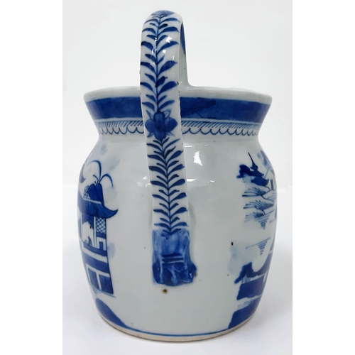 218 - An Early 19th Century Chinese Blue and White Jug with Bowl.
Bowl - 28cm diameter. Jug - 14cm tall.