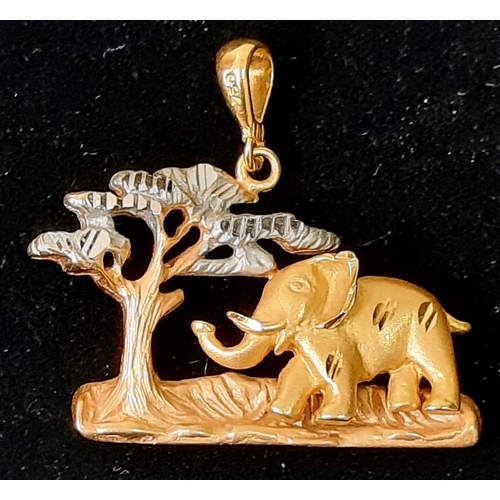 121 - A Beautiful 18k Yellow and White Gold Elephant in the Serengeti Pendant. 5.2g. 2.5cm x 3cm.