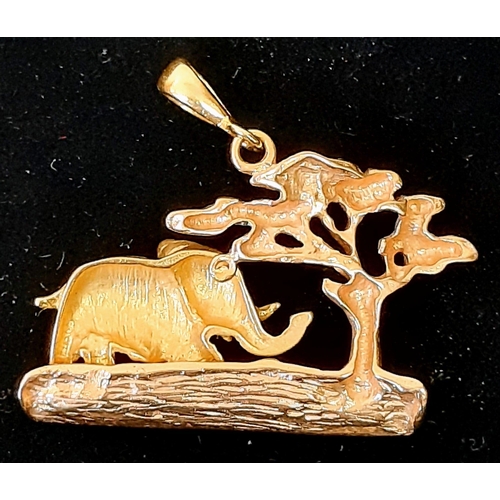 121 - A Beautiful 18k Yellow and White Gold Elephant in the Serengeti Pendant. 5.2g. 2.5cm x 3cm.