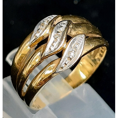 16 - A 9K Yellow Gold Three Diamond Wave Ring. Size O. 4g total weight.