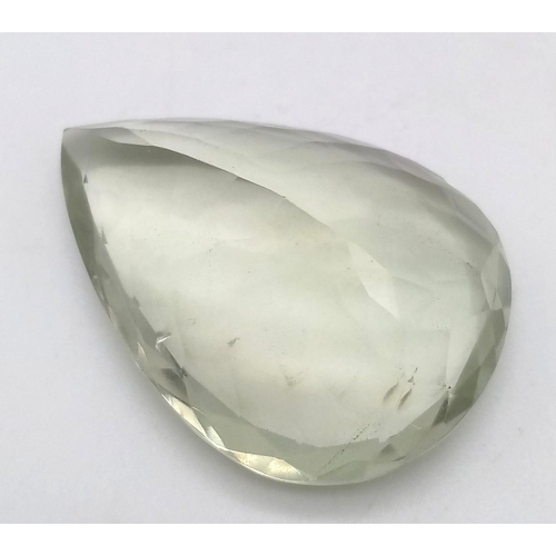 124 - A large (38.95 carats), green amethyst (often called Prasiolite ). Pear shaped in excellent conditio... 