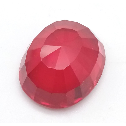 154 - A high quality, large (31.7 carats), pigeon blood red ruby. Oval cut, lab created, with excellent co... 