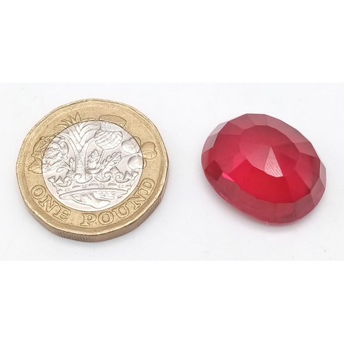 154 - A high quality, large (31.7 carats), pigeon blood red ruby. Oval cut, lab created, with excellent co... 