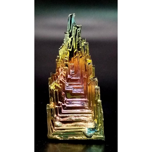 238 - A mesmerising BISMUTH crystal. Dimensions: 52 x 27 x 24 mm, weight: 66 g. Bismuth is a natural metal... 