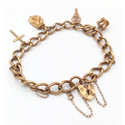 37 - A Vintage 9K Yellow Gold Charm Bracelet with Heart Clasp. Four charms. 16.3g total weight.