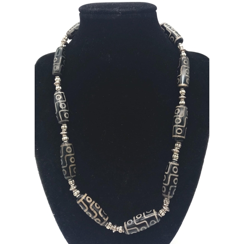 203 - A very collectable, Nepalese, nine eyed DZI necklace and earrings set. According to Tibetan Folklore... 