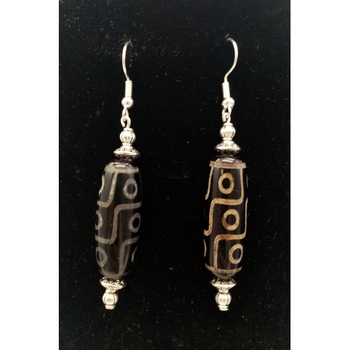 203 - A very collectable, Nepalese, nine eyed DZI necklace and earrings set. According to Tibetan Folklore... 