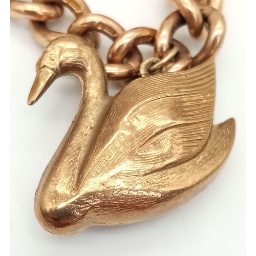 131 - A Vintage 9K Charm Bracelet with Gold Clasp. Ten charms including: Swan, Bunny and Articulated Fish!... 