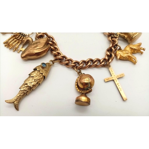 131 - A Vintage 9K Charm Bracelet with Gold Clasp. Ten charms including: Swan, Bunny and Articulated Fish!... 