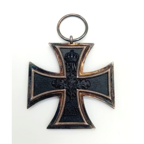 76 - WW1 Imperial German Iron Cross 2nd Class in presentation box. The medal is of 3-part construction wi... 