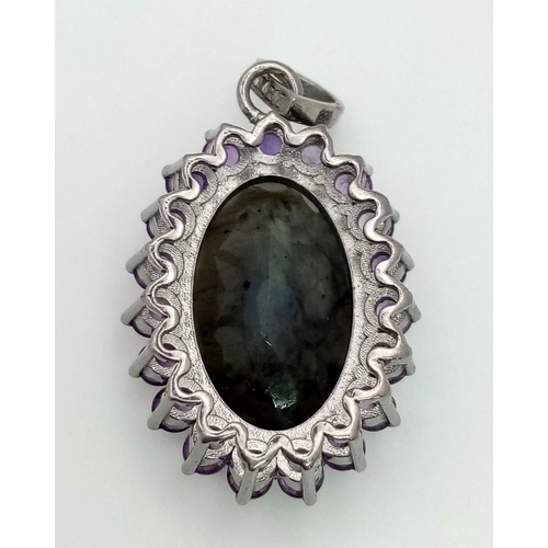 936 - A Labradorite and Amethyst Pendant with Rose cut Diamonds set in 925 Sterling silver. 17.50ct gems. ... 