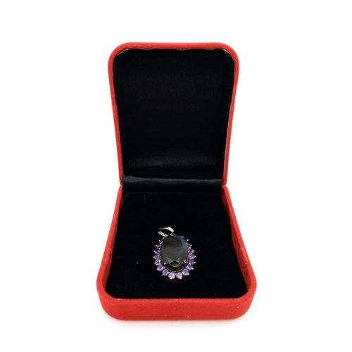 936 - A Labradorite and Amethyst Pendant with Rose cut Diamonds set in 925 Sterling silver. 17.50ct gems. ... 