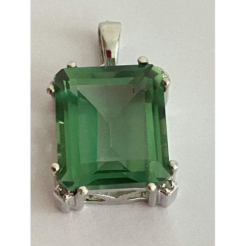 105 - Beautiful 5 carat EMERALD PENDANT . Lab made and set in an attractive SILVER MOUNT. Having marking f... 