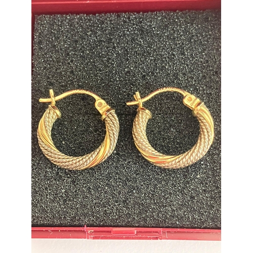 77 - Pair of 14 carat GOLD HOOP EARRINGS with attractive Silver rope detail. 1.34 grams.