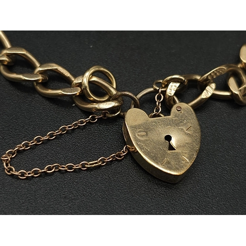 33 - 9K YELLOW GOLD CHARM BRACELET WITH PADLOCK CLASP AND SAFETY CHAIN, WEIGHT 11.5G