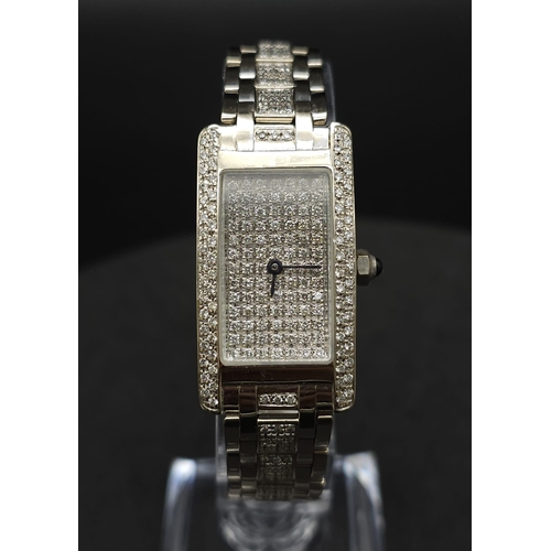 186 - A 14K WHITE GOLD LADIES DRESS WATCH WITH PAVE SET DIAMONDS   64gms in weight, MANUAL MOVEMENT 18mm