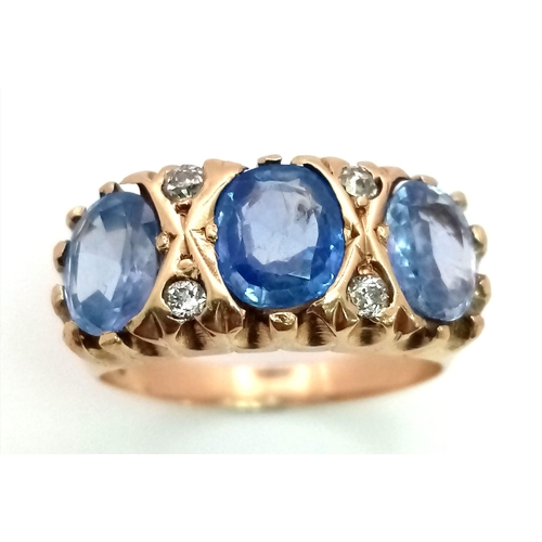 191 - An 18k Yellow Gold Natural Three Stone Ceylon Untreated Sapphire with Diamonds Ring. Old cut diamond... 