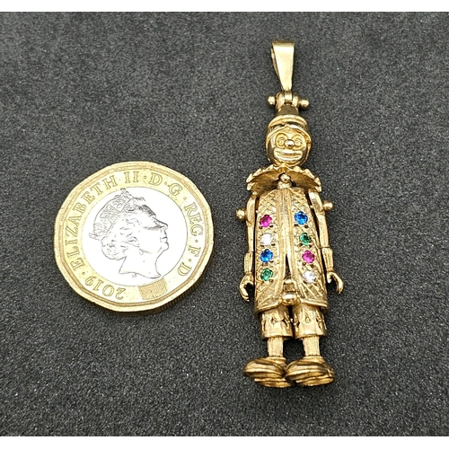 194 - A LARGE 9K YELLOW GOLD GEM SET CLOWN PENDANT, WEIGHT 9.7G AND 5CM LONG APPROX