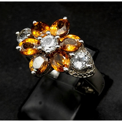 939 - An Unworn Limited Edition (1 of 44) Sterling Silver Cognac Zircon and White Topaz Ring Size R. 4.05 ... 