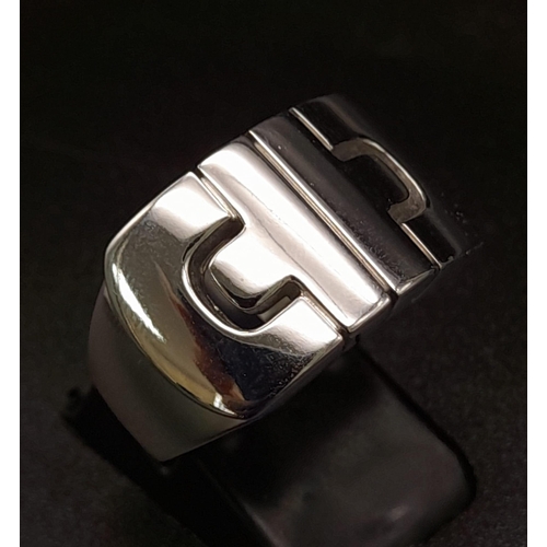 67 - A GENTS BULGARI RING IN 18K WHITE GOLD IN AS NEW CONDITION . 11.5gms    size O