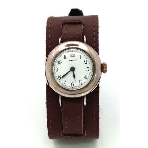 51 - An Ultra Rare 1912 Silver Rolex Ladies Watch. Brown Double leather strap. 925 silver case -29mm with... 