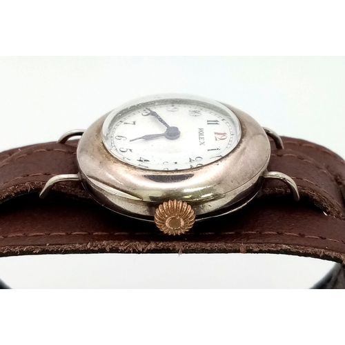 51 - An Ultra Rare 1912 Silver Rolex Ladies Watch. Brown Double leather strap. 925 silver case -29mm with... 