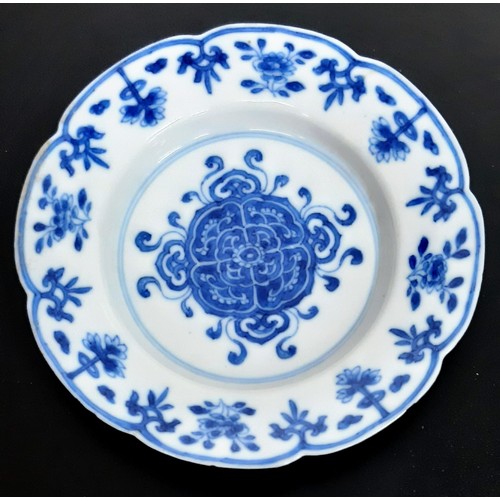 141 - An Early Chinese Small Lobed Octagonal Blue and White Plate. Kang hsi period with Ming reign mark. 1... 