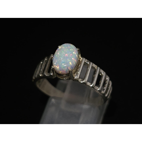 1666 - A 925 Silver Opal Ring. Total Weight 2.33g. Size Q/R