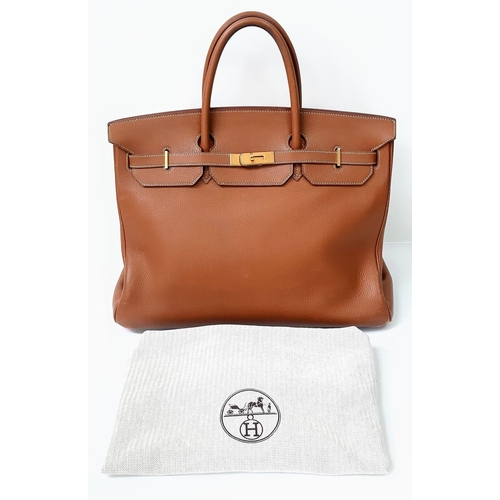 17 - A Hermes Birkin Brown Leather Tote Bag. Handcrafted from the highest quality leather by skilled craf... 