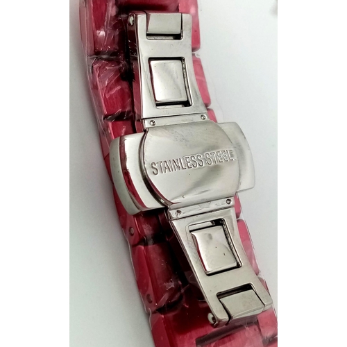 170 - A Vivienne Westwood 'Let it Rock' Pink Ceramic watch. Case -35mm. Quartz movement, as new, in workin... 