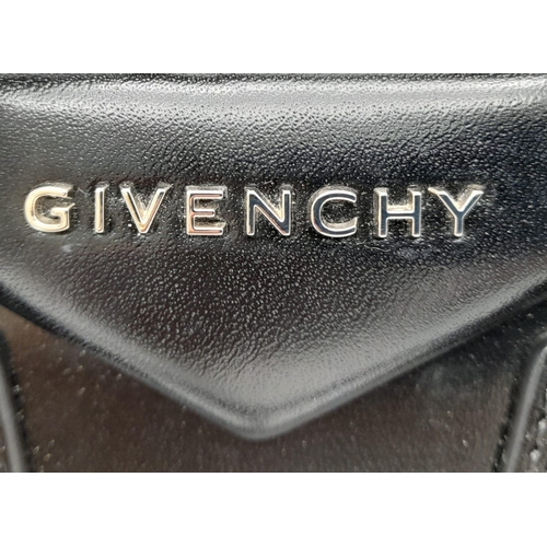 171 - A Luxury Givenchy Mini Antigona Black Leather Hand/Shoulder Bag. Rich black leather with silver tone... 